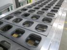 Used Holmatic model PR-4S Inline Cup Filler and Sealer. Last ran bowl of mac and cheese. The bowl measure 6 1/4” long x 5 1/2” wide x 2 3/8” high. This machine is servo with a Spee-Dee volumetric cup...
