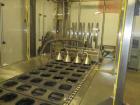 Used Holmatic model PR-4S Inline Cup Filler and Sealer. Last ran bowl of mac and cheese. The bowl measure 6 1/4” long x 5 1/2” wide x 2 3/8” high. This machine is servo with a Spee-Dee volumetric cup...
