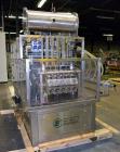 Used Pack Line PXM-5 Cup Filling and Sealing Machine. Unit is a five lane system with speeds rated from 30 to 50 cycles per minute (depending on product and cup size). Currently set up for 3
