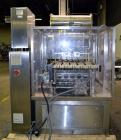Used Pack Line PXM-5 Cup Filling and Sealing Machine. Unit is a five lane system with speeds rated from 30 to 50 cycles per minute (depending on product and cup size). Currently set up for 3