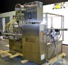 Used Pack Line PXM-5 Cup Filling and Sealing Machine. Unit is a five lane system with speeds rated from 30 to 50 cycles per minute (depending on product and cup size). Currently set up for 3