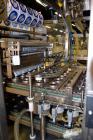 Used Pack Line PXM-5 Cup Filling and Sealing Machine. Unit is a five lane system with speeds rated from 30 to 50 cycles per minute (depending on product and cup size). Currently set up for 3