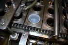Used Pack Line PXM-5 Cup Filling and Sealing Machine. Unit is a five lane system with speeds rated from 30 to 50 cycles per minute (depending on product and cup size). Currently set up for 3