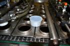 Used Pack Line PXM-5 Cup Filling and Sealing Machine. Unit is a five lane system with speeds rated from 30 to 50 cycles per minute (depending on product and cup size). Currently set up for 3