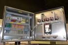 Used Pack Line PXM-5 Cup Filling and Sealing Machine. Unit is a five lane system with speeds rated from 30 to 50 cycles per minute (depending on product and cup size). Currently set up for 3