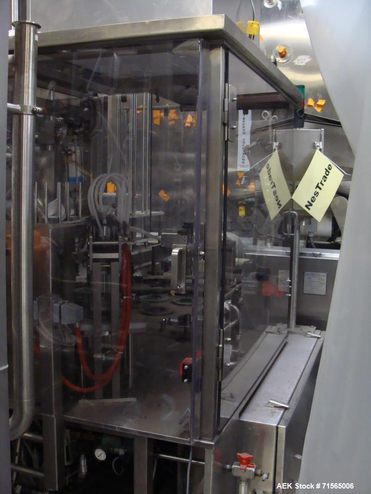 Used AutoProd Model R0A7 Two-Head Rotary Cup Filler.