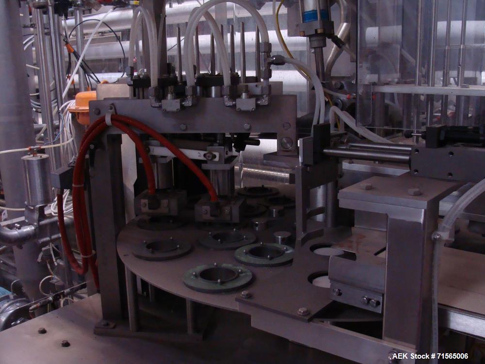 Used AutoProd Model R0A7 Two-Head Rotary Cup Filler.
