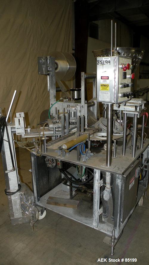 Used Autoprod Cup Filler, Model RO-A3, 8 station, stainless steel. Currently set up for 4-1/4" diameter cups. Jacketed stainless steel hopper. Includes change parts, film die cut station, cup feed st...
