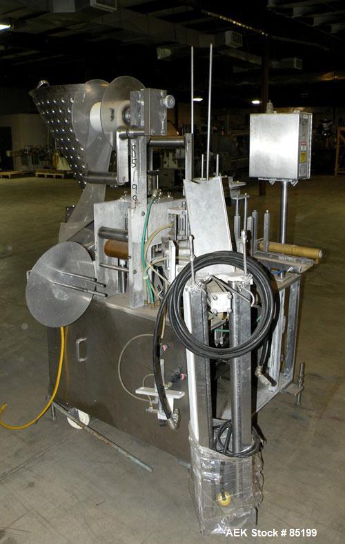 Used Autoprod Cup Filler, Model RO-A3, 8 station, stainless steel. Currently set up for 4-1/4" diameter cups. Jacketed stainless steel hopper. Includes change parts, film die cut station, cup feed st...