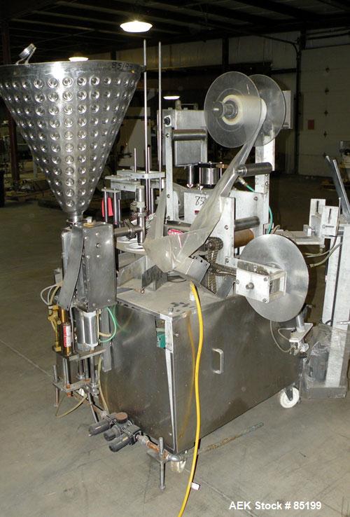 Used Autoprod Cup Filler, Model RO-A3, 8 station, stainless steel. Currently set up for 4-1/4" diameter cups. Jacketed stainless steel hopper. Includes change parts, film die cut station, cup feed st...