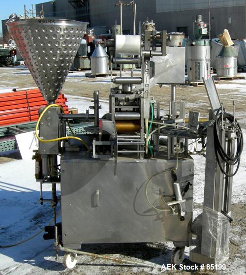 Used Autoprod Cup Filler, Model RO-A3, 8 station, stainless steel. Currently set up for 4-1/4" diameter cups. Jacketed stainless steel hopper. Includes change parts, film die cut station, cup feed st...