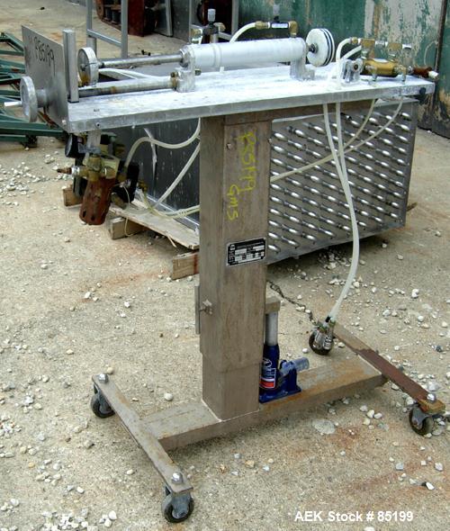 Used Autoprod Cup Filler, Model RO-A3, 8 station, stainless steel. Currently set up for 4-1/4" diameter cups. Jacketed stainless steel hopper. Includes change parts, film die cut station, cup feed st...