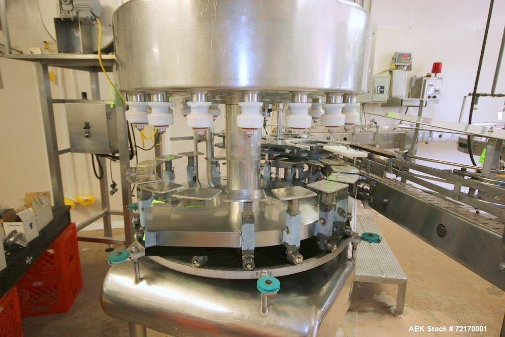 Used-Federal 18-Valve Rotary Filler, with 5-Station Rotary Capper, with Stand Alone Capping Feed System, Mounted on Stainles...