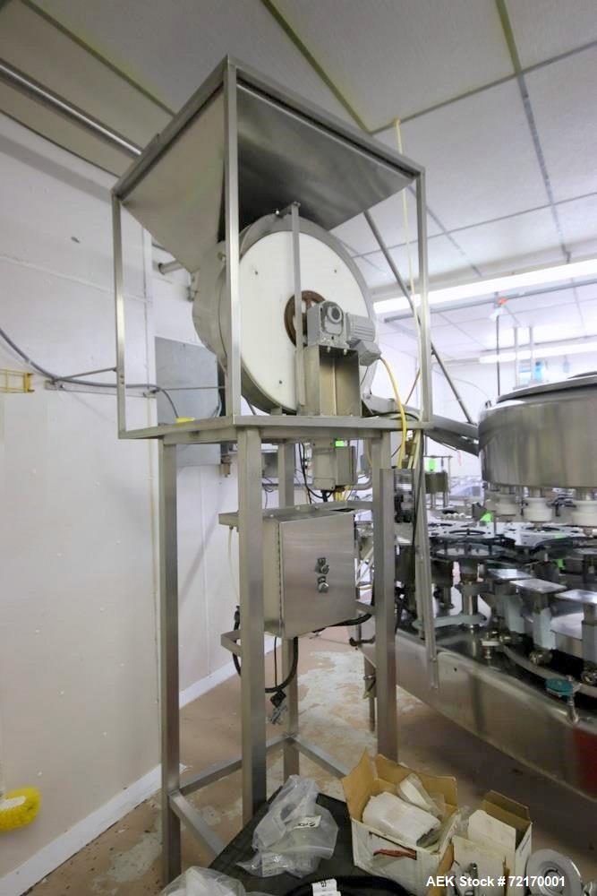 Used-Federal 18-Valve Rotary Filler, with 5-Station Rotary Capper, with Stand Alone Capping Feed System, Mounted on Stainles...