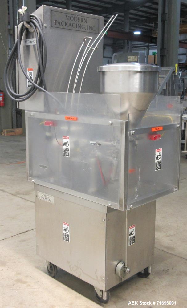 Used Modern Packaging Inc. Model SR-8DC Rotary Cup Filler/Sealer