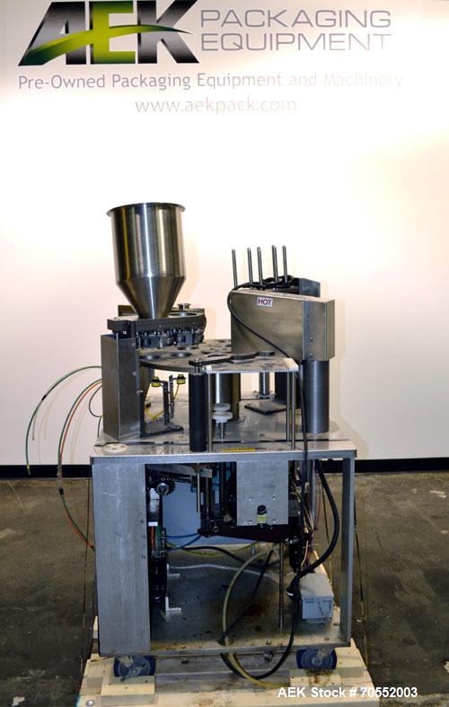 Used Wilpack Packaging 201 Seal N PeelRotary Cup Filler capable of speeds up to 80 cpm.Max cup diameter 3-1/2" (with changeparts).Dual lane six station unit with bottom up fill, dual positive displac...