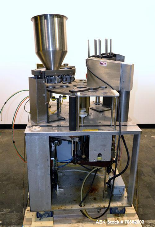 Used Wilpack Packaging 201 Seal N PeelRotary Cup Filler capable of speeds up to 80 cpm.Max cup diameter 3-1/2" (with changeparts).Dual lane six station unit with bottom up fill, dual positive displac...