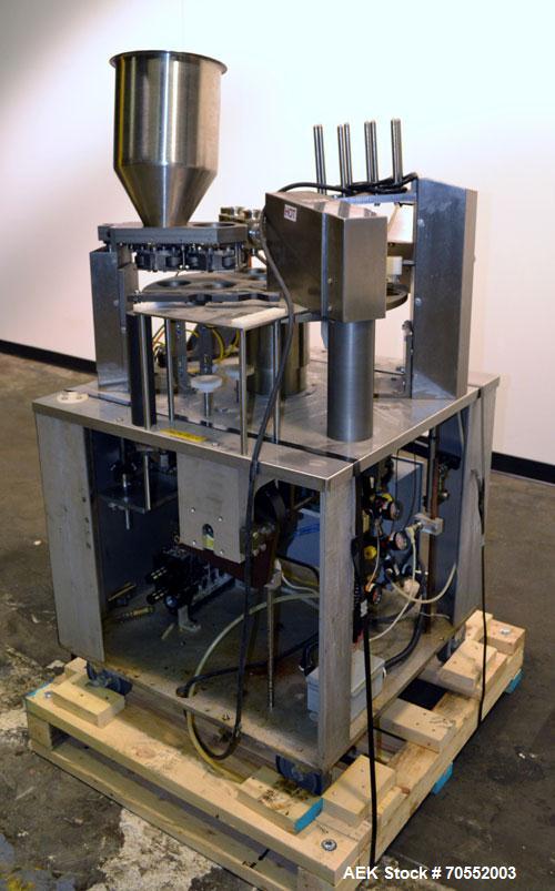 Used Wilpack Packaging 201 Seal N PeelRotary Cup Filler capable of speeds up to 80 cpm.Max cup diameter 3-1/2" (with changeparts).Dual lane six station unit with bottom up fill, dual positive displac...