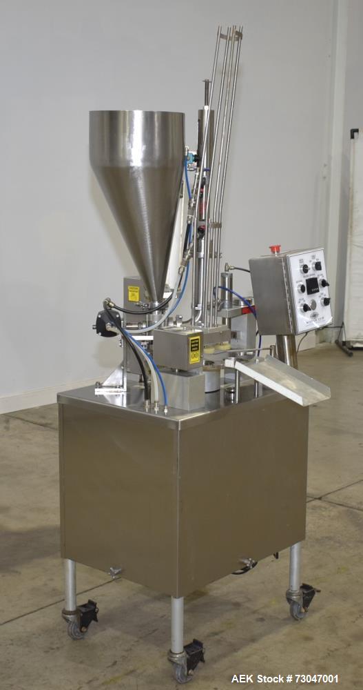 Used- World Cup Rotary Cup Filling Machine, Model #8-12. 8 Stations. Hopper capacity 2.5 Gallons, 11.25" diameter. Originall...