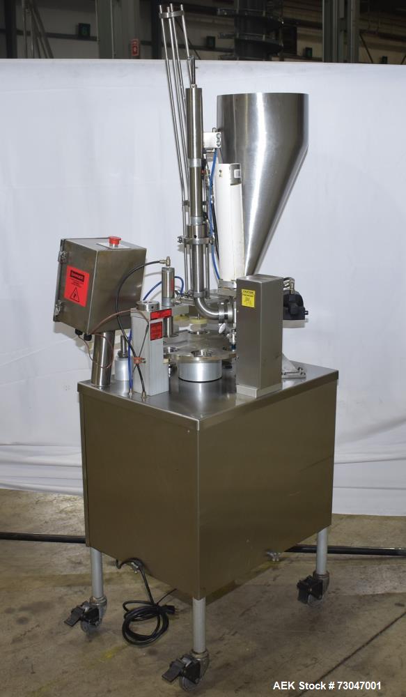 Used- World Cup Rotary Cup Filling Machine, Model #8-12. 8 Stations. Hopper capacity 2.5 Gallons, 11.25" diameter. Originall...