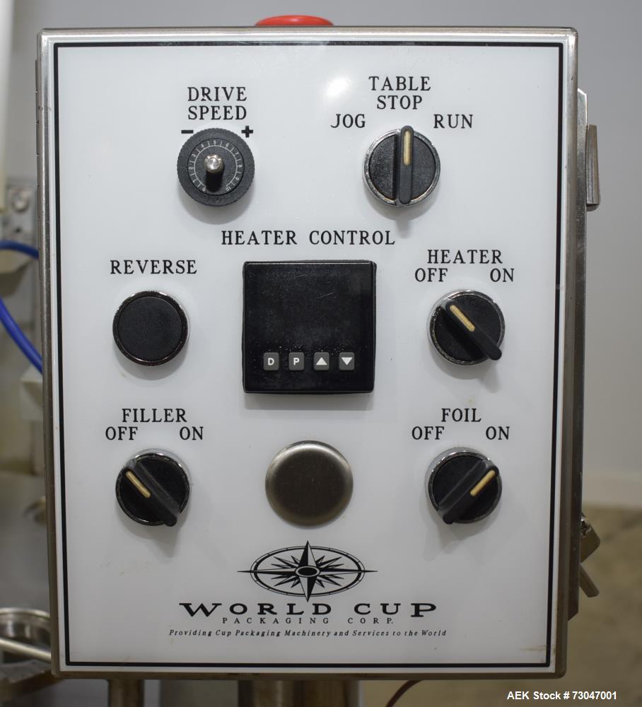 Used- World Cup Rotary Cup Filling Machine, Model #8-12. 8 Stations. Hopper capacity 2.5 Gallons, 11.25" diameter. Originall...