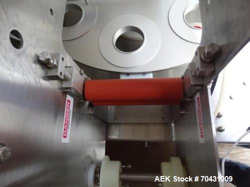 Used World Cup Packaging 8-80 Cup Filler. Container size: up to 80 ounces or up to 6.5 inch maximum diameter with change parts from the OEM. Filling speed: up to 40 indexes per minute depending on cu...