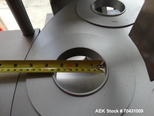 Used World Cup Packaging 8-80 Cup Filler. Container size: up to 80 ounces or up to 6.5 inch maximum diameter with change parts from the OEM. Filling speed: up to 40 indexes per minute depending on cu...