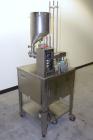 Used Autoprod (Oystar) Model 2000 Fil-N-Seal Rotary Cup Filler and Heat Sealer. Filler for thin liquids only water like product. Capable of speeds up to 60 cpm. Cup size range: diameter 1