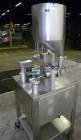 Used Autoprod (Oystar) Model 2000 Fil-N-Seal Rotary Cup Filler and Heat Sealer. Filler for thin liquids only water like product. Capable of speeds up to 60 cpm. Cup size range: diameter 1