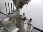 Used Autoprod (Oystar) Model 2000 Fil-N-Seal Rotary Cup Filler and Heat Sealer. Filler for thin liquids only water like product. Capable of speeds up to 60 cpm. Cup size range: diameter 1