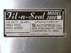 Used Autoprod (Oystar) Model 2000 Fil-N-Seal Rotary Cup Filler and Heat Sealer. Filler for thin liquids only water like product. Capable of speeds up to 60 cpm. Cup size range: diameter 1