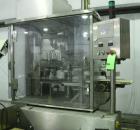 Used AutoProd Model R0A7 Two-Head Rotary Cup Filler.