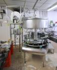 Used-Federal 18-Valve Rotary Filler, with 5-Station Rotary Capper, with Stand Alone Capping Feed System, Mounted on Stainles...