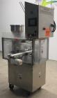 Used Modern Packaging Inc. Model SR-8DC Rotary Cup Filler/Sealer