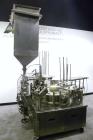 Used Pryor Packaging Machinery 2 Head Rotary Cup Filler and Lidder, Model 51190