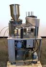 Used Wilpack Packaging 201 Seal N PeelRotary Cup Filler capable of speeds up to 80 cpm.Max cup diameter 3-1/2