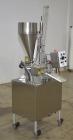 Used- World Cup Rotary Cup Filling Machine, Model #8-12. 8 Stations. Hopper capacity 2.5 Gallons, 11.25