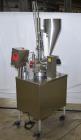 Used- World Cup Rotary Cup Filling Machine, Model #8-12. 8 Stations. Hopper capacity 2.5 Gallons, 11.25