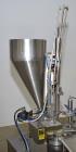 Used- World Cup Rotary Cup Filling Machine, Model #8-12. 8 Stations. Hopper capacity 2.5 Gallons, 11.25