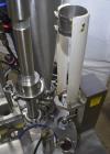 Used- World Cup Rotary Cup Filling Machine, Model #8-12. 8 Stations. Hopper capacity 2.5 Gallons, 11.25