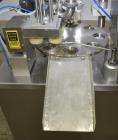 Used- World Cup Rotary Cup Filling Machine, Model #8-12. 8 Stations. Hopper capacity 2.5 Gallons, 11.25