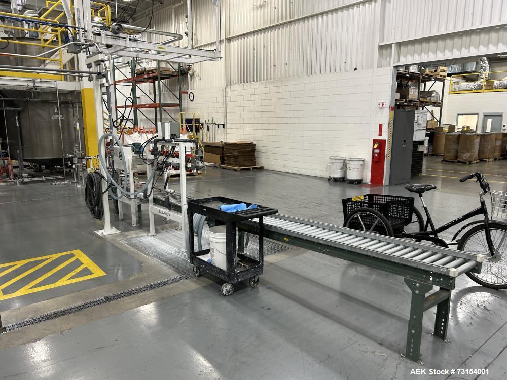 Used Complete 5 Gallon Pail Filling Line with Filler and Lidder. Filler is a 4 head unit with manual lid plcement and automatic lid sealing station. Includes interconnecting roller conveyor.