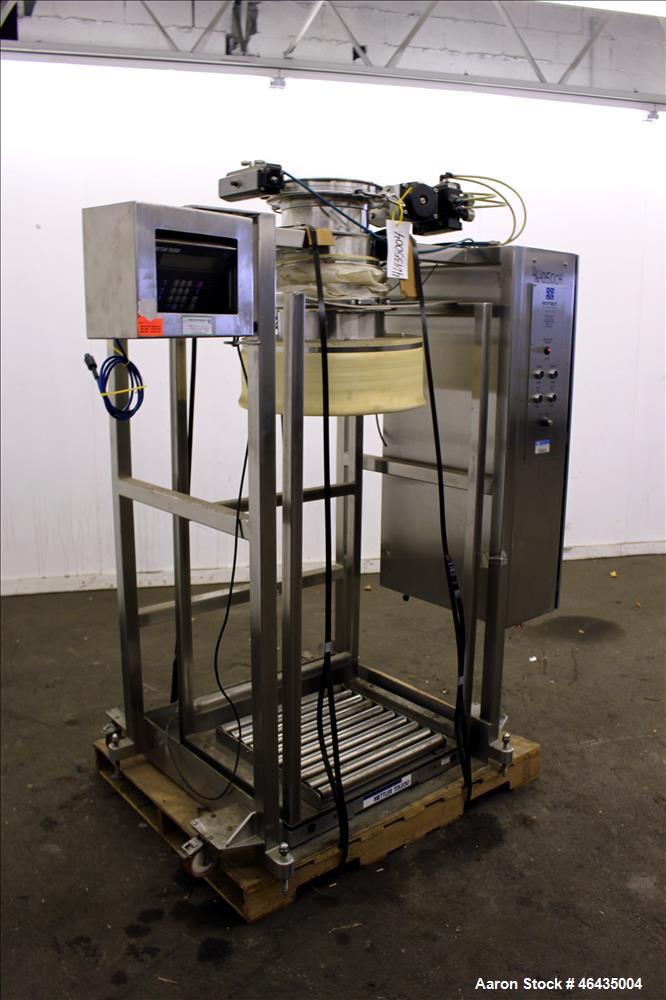 Used- Extract Technology Pack-Off Isolator. 10" Diameter filling head with 20-3/4" diameter cone sealing head. Top pneumatic...