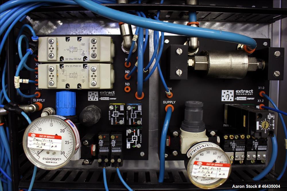 Used Extract Technology Pack-Off Isolator. 10" Diameter filling head with 20-3/4" diameter cone sealing head. Top pneumatic butterfly valve. Side infeed. Has mettler Toledo scale 24" x 30" platform. ...