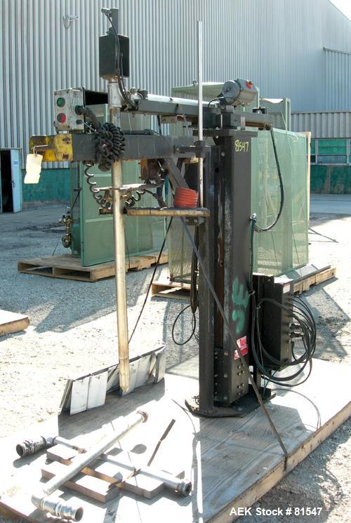 Used Mettler Toledo XP drum filling system consisting of: (1) Mettler model 9127 drum filler, approximate 2" diameter x 36" long stainless steel filling tube, (1) 50" wide x 5' long powered roller co...