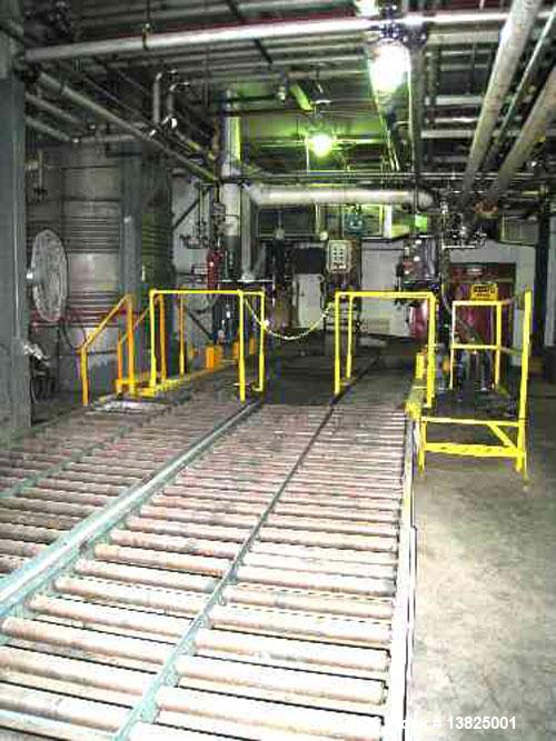 Used Toledo scale model 9127. Automatic drum filling line, double train for filling single drums. One man station load cell controlled plc, air actuated valves, and drum control. Approximate size 10'...