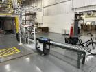 Used Complete 5 Gallon Pail Filling Line with Filler and Lidder. Filler is a 4 head unit with manual lid plcement and automatic lid sealing station. Includes interconnecting roller conveyor.