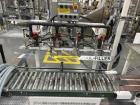 Used Complete 5 Gallon Pail Filling Line with Filler and Lidder. Filler is a 4 head unit with manual lid plcement and automatic lid sealing station. Includes interconnecting roller conveyor.