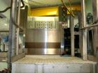 Used Extract Technology Solids Charge Station. Unit includes bin tipping, fine dust filter, Hepa filter and glovebox. Includes local control panel. Built 2007.