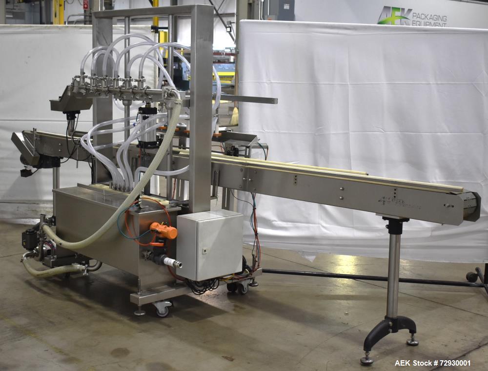 Used Accutek APOF Series Automatic Pressure 6 Head Overflow Filler, Model APOF-6. (6) Stainless steel nozzles, 4.5" x 5/8" diameter. Filling speed of up to 60 CPM. Viscosity range of 2,000 cps (Centi...